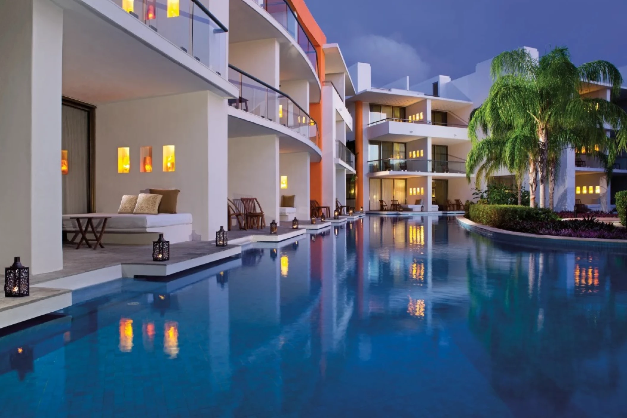 swim out suites at night at Secrets Aura Cozumel