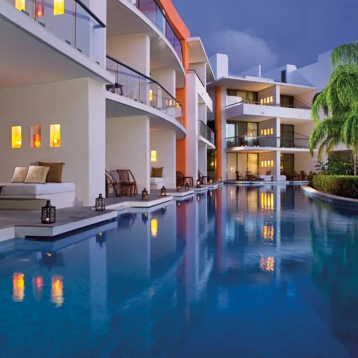 swim out suites at night at Secrets Aura Cozumel