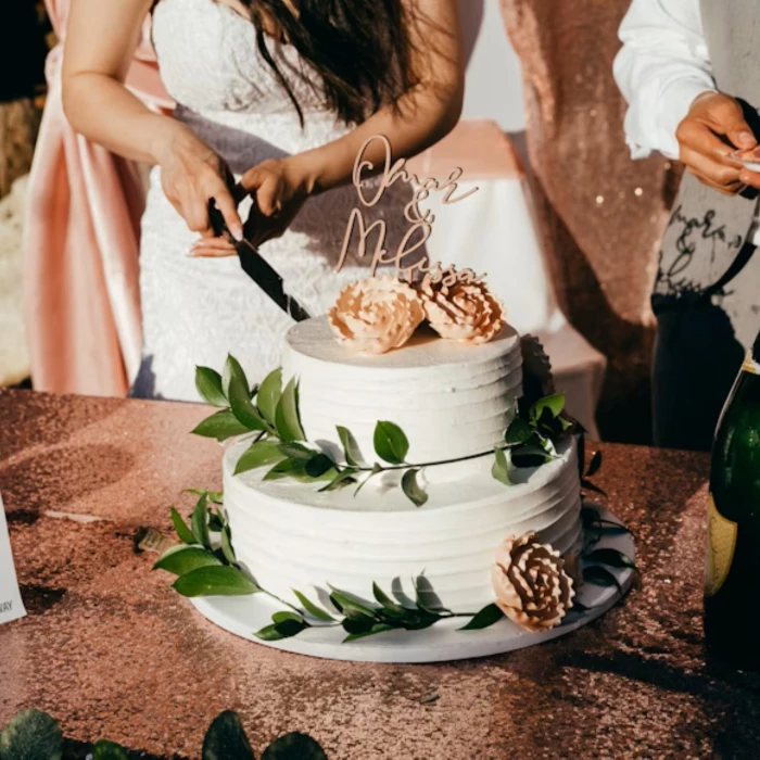 couple cutting wedding cake