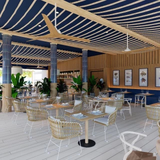 The Seaside Grill restaurant with a nautical theme, featuring blue ceilings, rope accents, and wicker chairs.