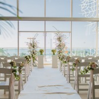 Wedding ceremony setup at Convention Center Foyer in Secrets The Vine Cancun.