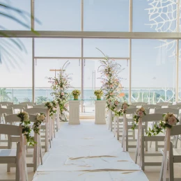 Wedding ceremony setup at Convention Center Foyer in Secrets The Vine Cancun.