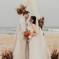 groom and bride on the beach