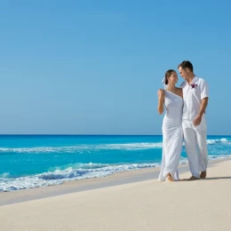 Ceremony setup on the Barracuda beach venue at Secrets Wild Orchid.