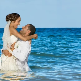 Couple on the beach at Secrets Wild Orchid