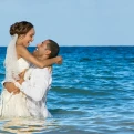 Couple on the beach at Secrets Wild Orchid