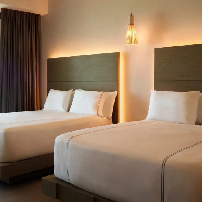 room with 2 beds at SLS Playa Mujeres