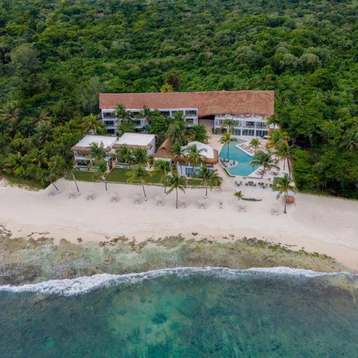 aerial view of The Beachfront by The Fives with its pools and accommodations and beach