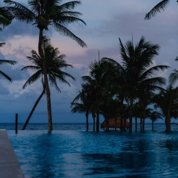 bride and groom at the pool terrace venue at The Beachfront by The Fives