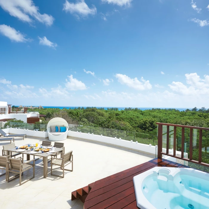 terrace of the two bedroom penthouse with private jacuzzi at The Fives Beach Hotel & Residences