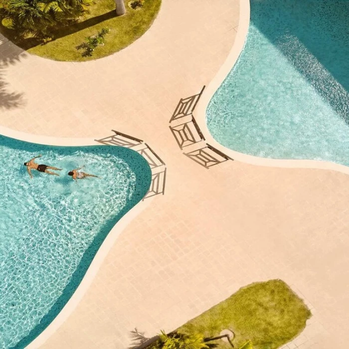 couple in the pool at TRS Turquesa