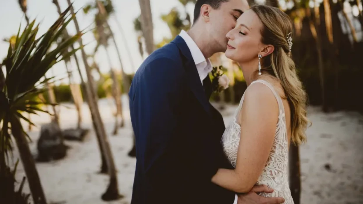 Couple on the beach at Valentin Imperial Maya resort