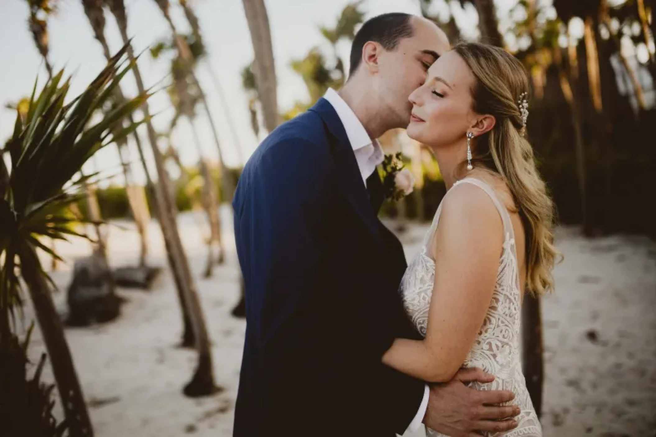 Couple on the beach at Valentin Imperial Maya resort