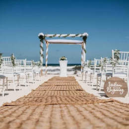 Beach ceremony decor at Valentin Imperial Maya resort