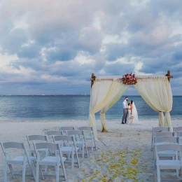 bride and groom on the beach at Villa del Palmar Cancun