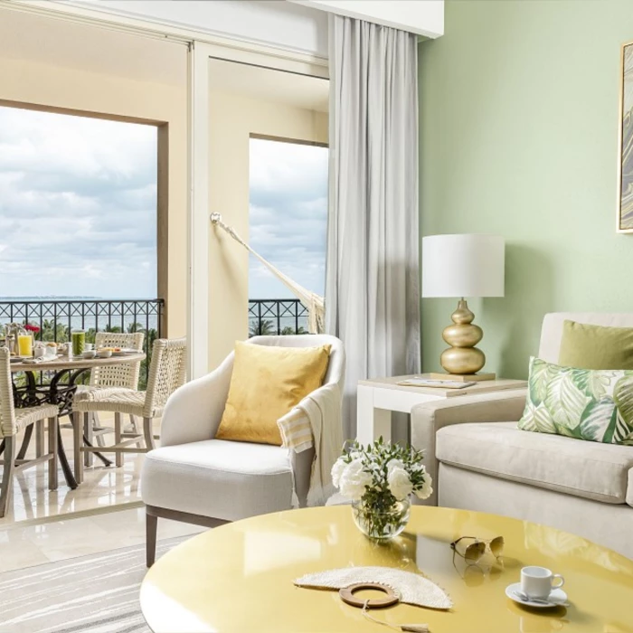 living space and balcony at the one bedroom suite at Villa del Palmar Cancun