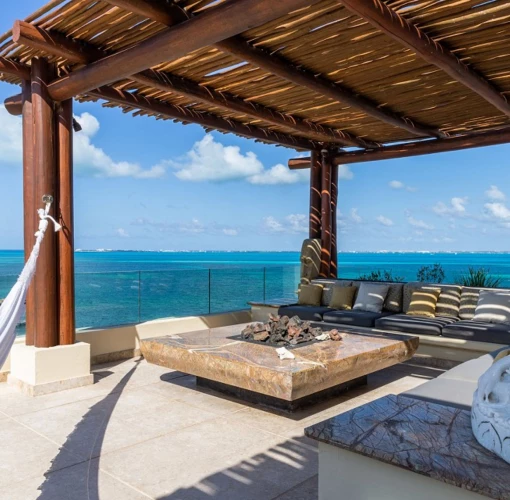 private terrace with hammock at the grand penthouse at Villa del Palmar Cancun