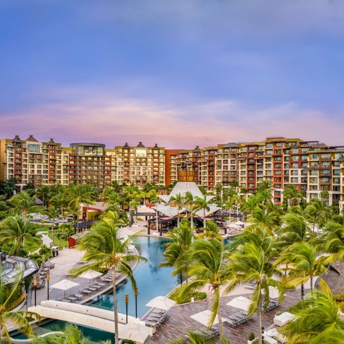 Villa del Palmar Cancun resort with its buildings and pools and palm trees