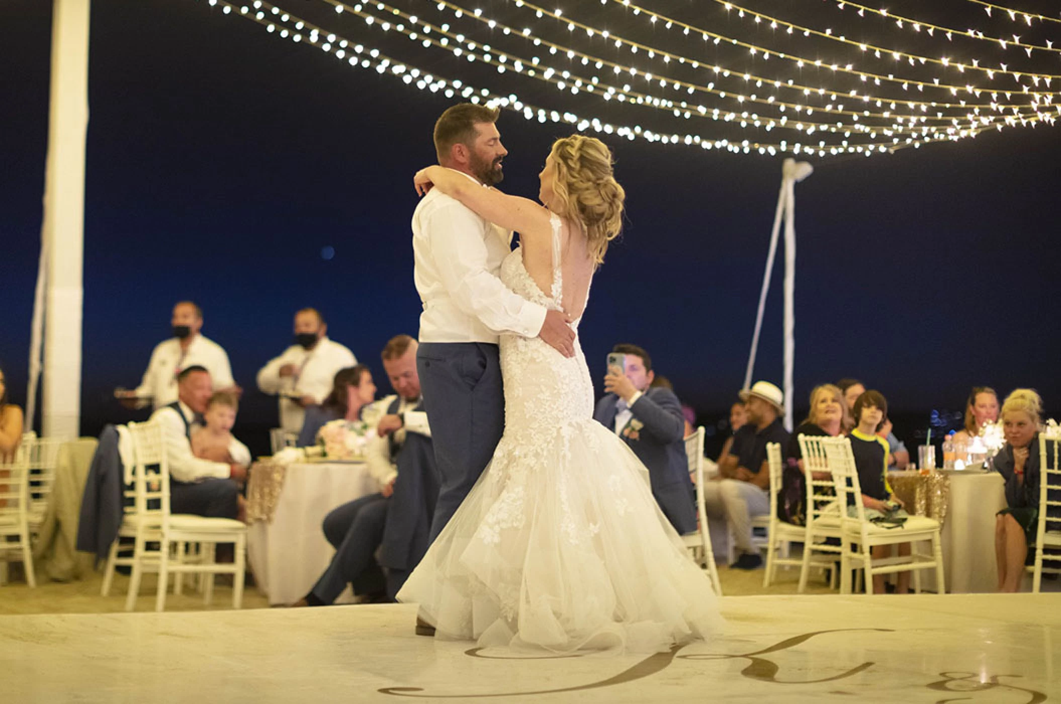 Couple dancing on bech wedding venue at Villa La Estancia Riviera Nayarit