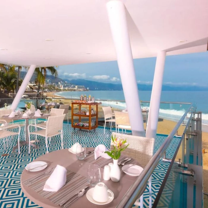 rooftop restaurant with ocean views at Villa Premiere Boutique Hotel