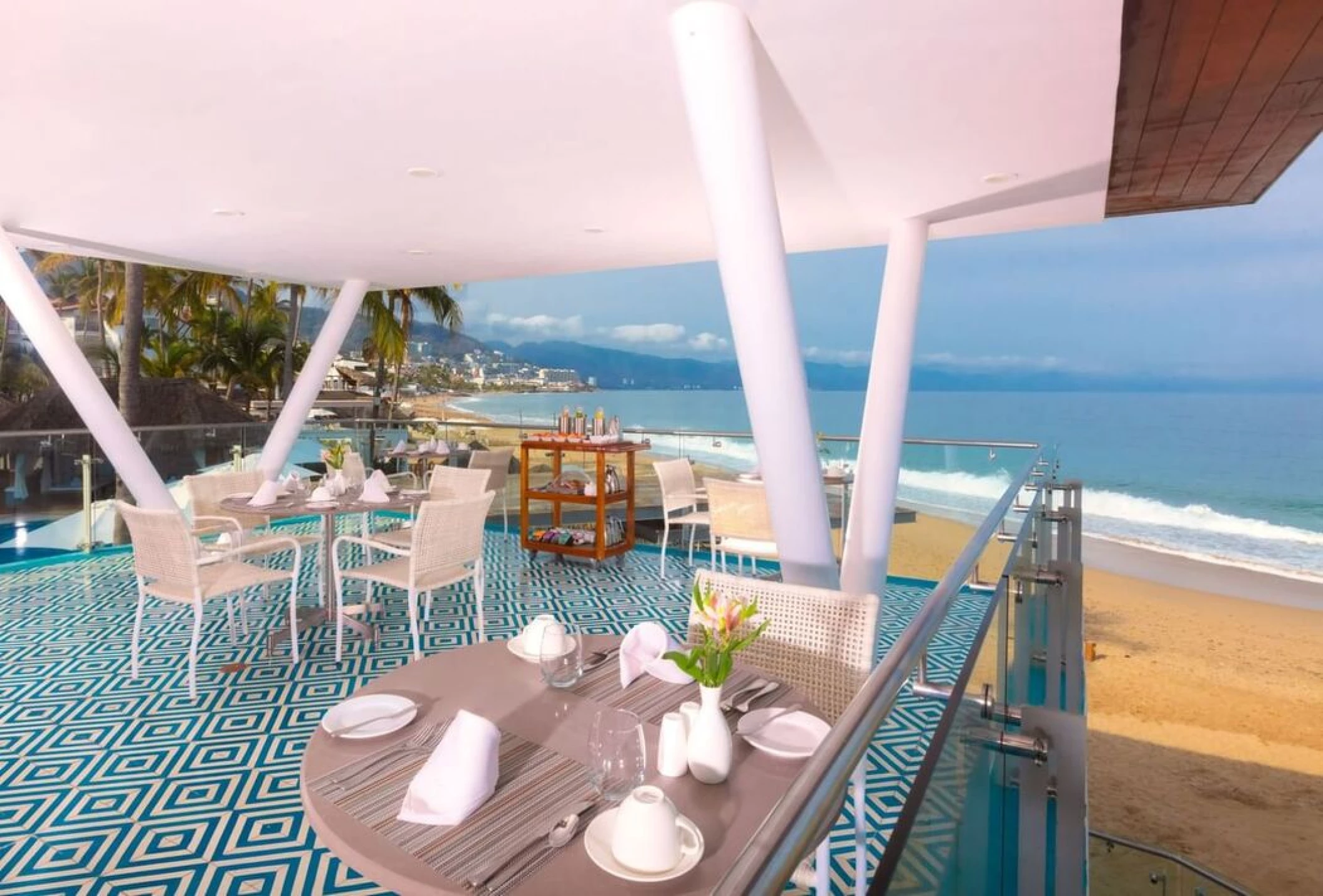 rooftop restaurant with ocean views at Villa Premiere Boutique Hotel