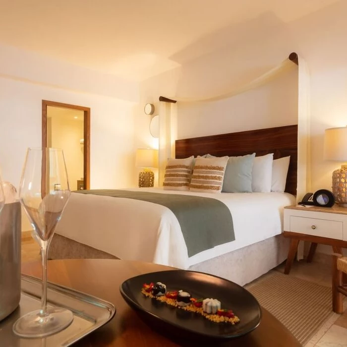 suite with welcome amenities at Villa Premiere Boutique Hotel