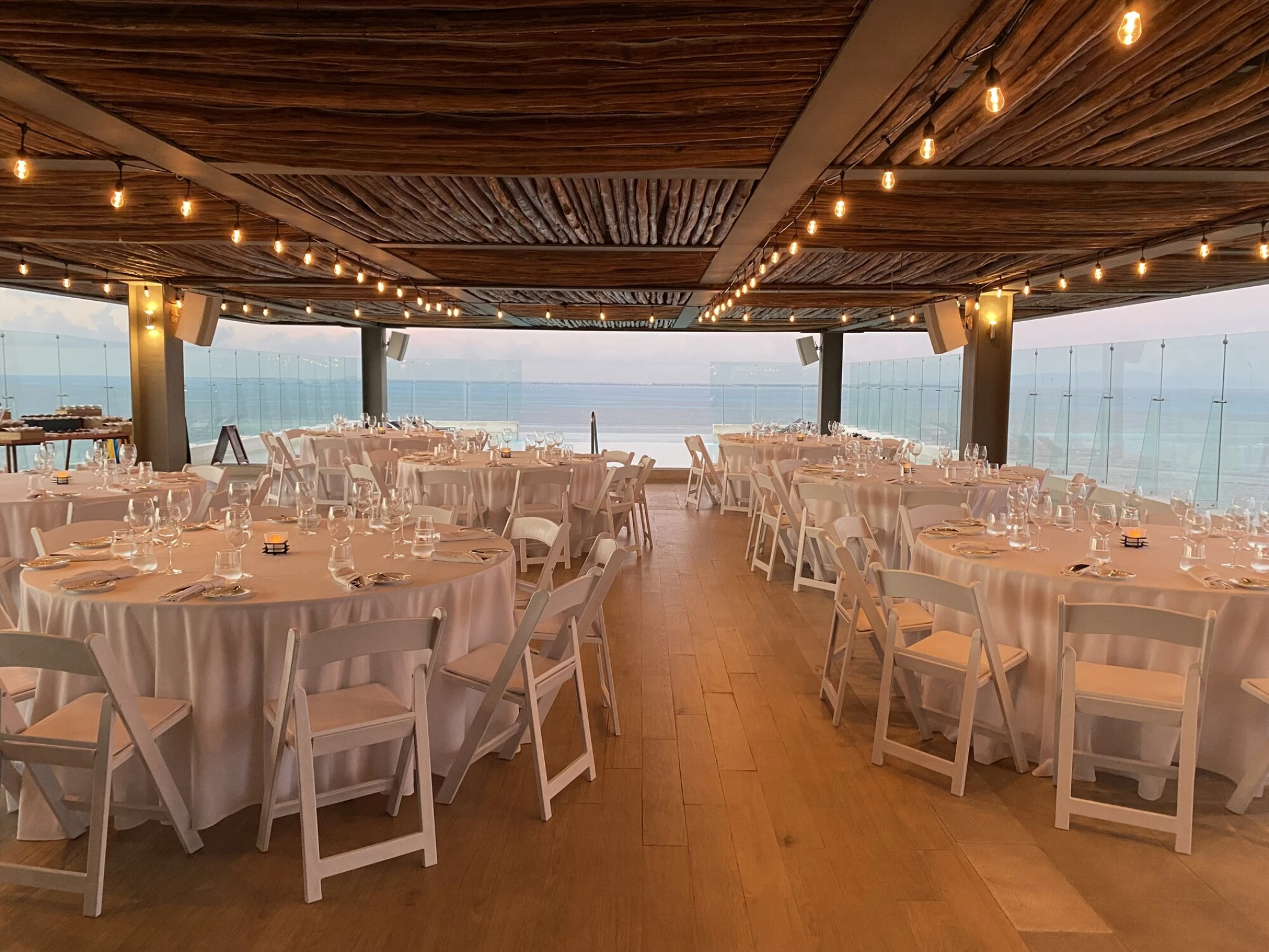 Dinner setup on Infinity Pool Rooftop Venue at Dreams Vista Cancun Golf and Spa