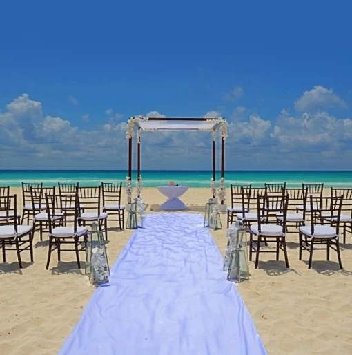 Royal Hideaway Playacar beach wedding venue with chairs