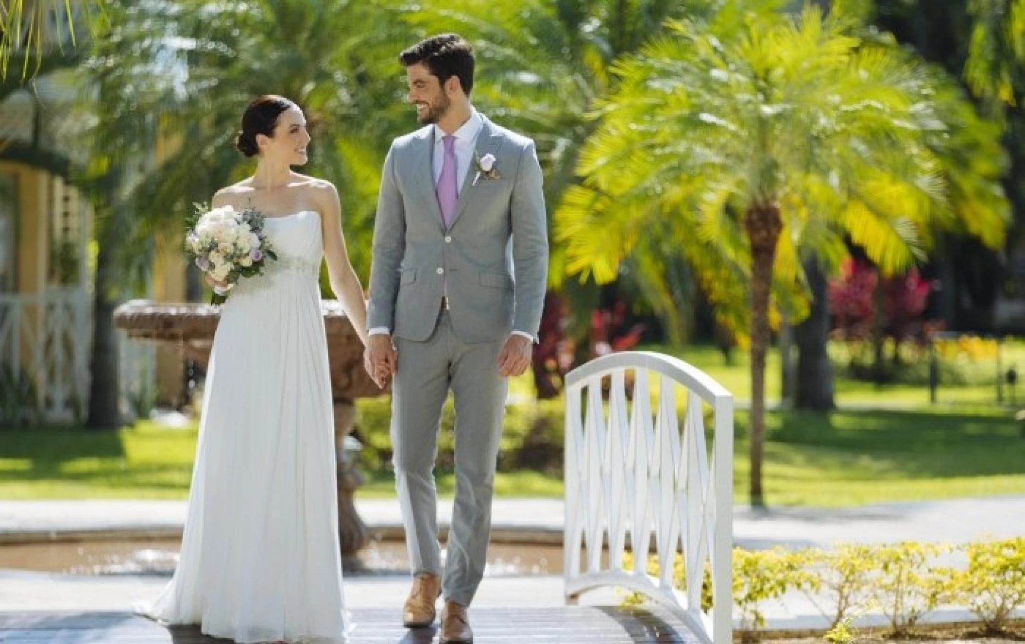 Couple walking on the terrace at Royal Hideaway Playacar Adults Only