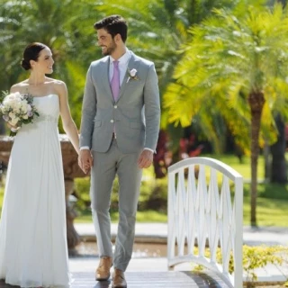 Couple walking on the terrace at Royal Hideaway Playacar Adults Only