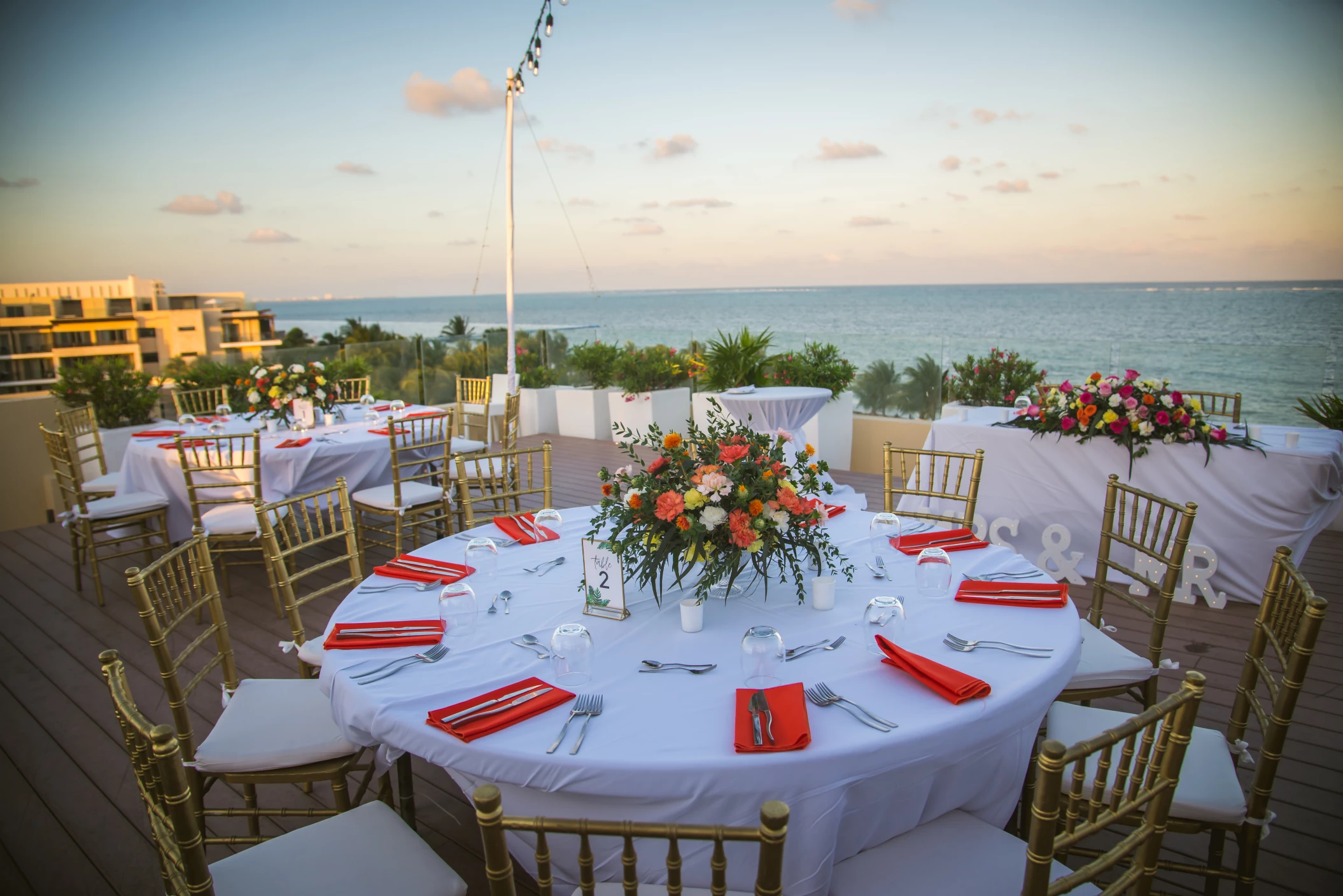 Dinner reception decor on the sky wedding at Royalton Riviera Cancun