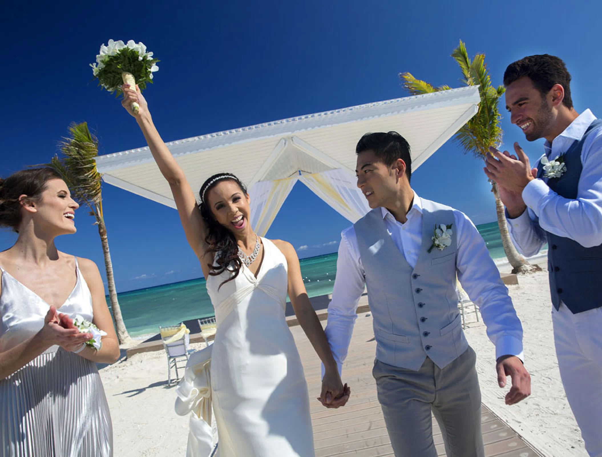 Newlyweds celebrating at Royalton Splash Riviera Cancun