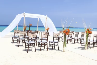Ceremony decor on the beach wedding venue at Sandos Cancun