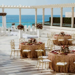 Ceremony and dinner reception decor on the terrace wedding venue at Sandos Cancun