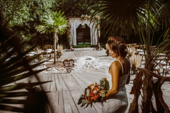 Ceremony decor on the cenote cristalino wedding venue at Sandos Caracol Eco Resort