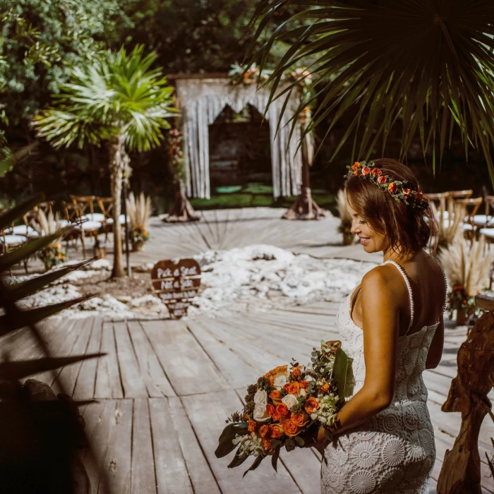 Ceremony decor on the cenote cristalino wedding venue at Sandos Caracol Eco Resort