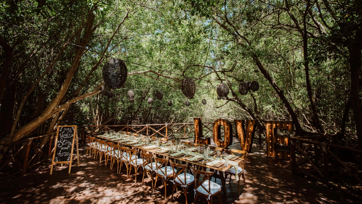 Dinner reception on the garden wedding venue at Sandos Caracol Eco Resort