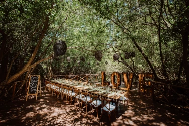 Dinner reception on the garden wedding venue at Sandos Caracol Eco Resort