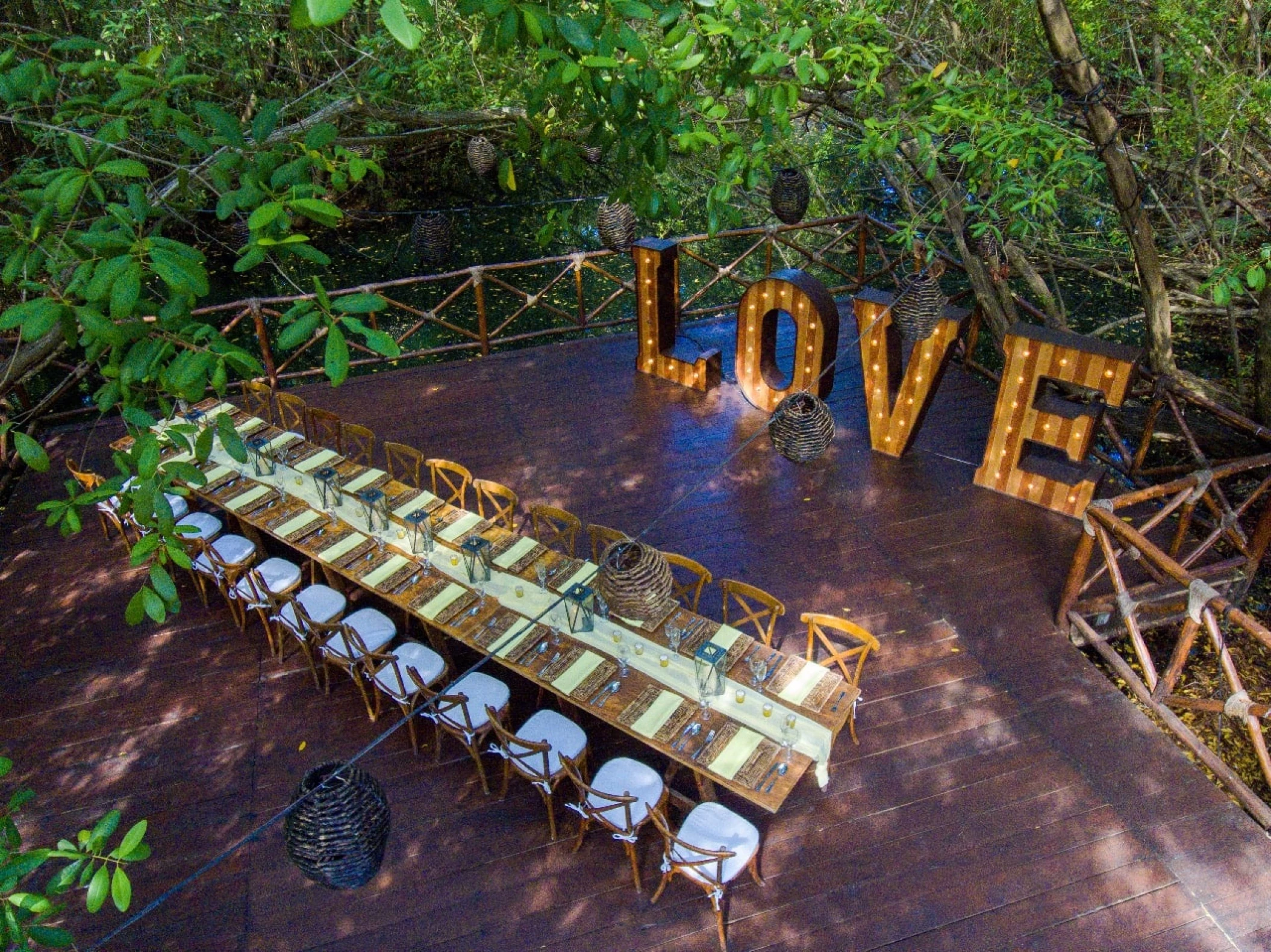 Dinner reception on Mapache Deck wedding venue at Sandos Caracol Eco Resort