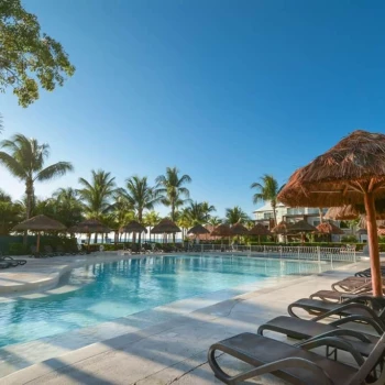 Sandos Caracol Eco Resort pool with lounge chairs