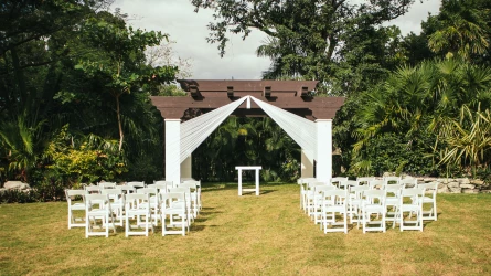 Ceremony decor on the garden wedding venue at Sandos Playacar Beach Resort