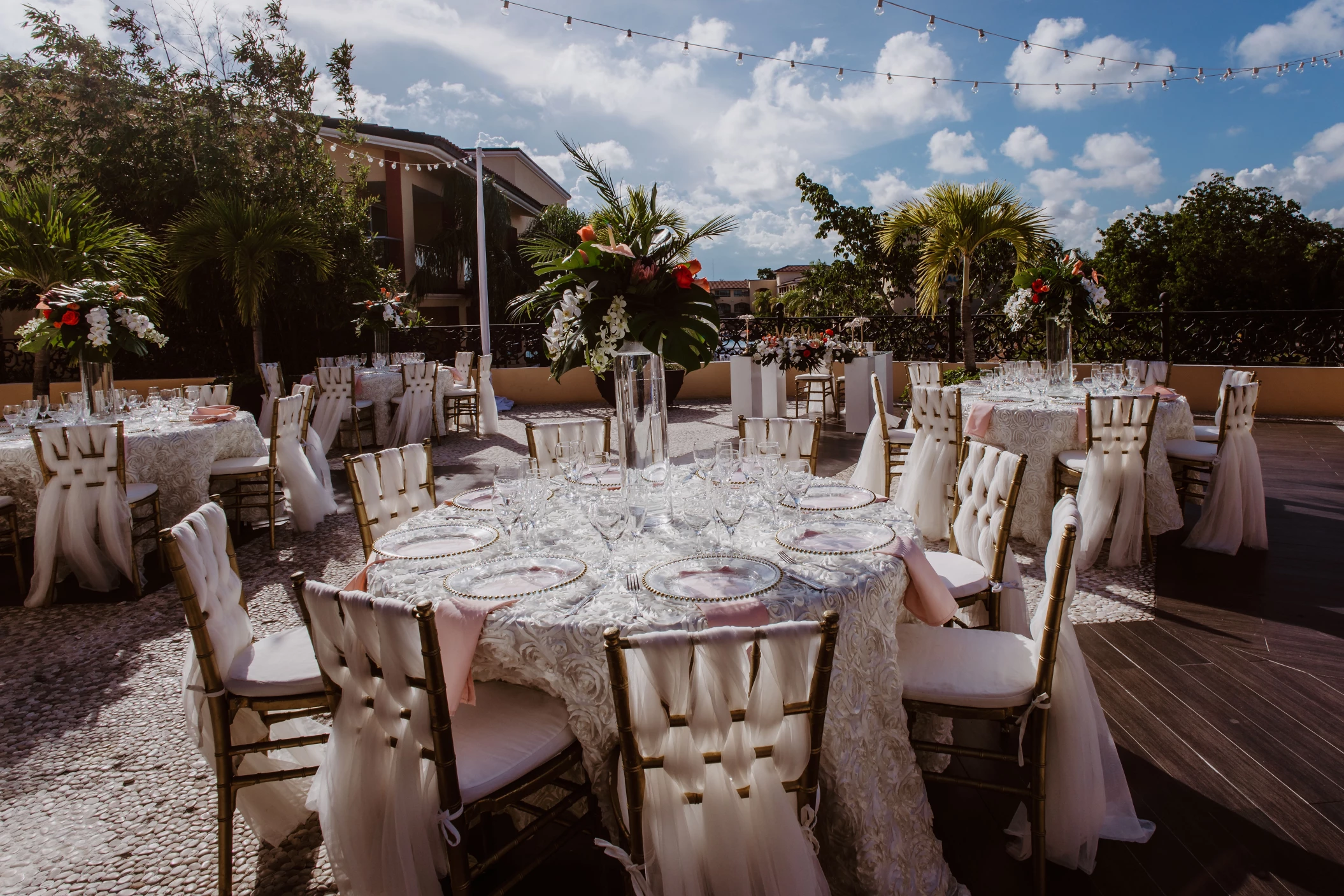 Dinner reception decor on the terrace wedding venue at Sandos Playacar Beach Resort
