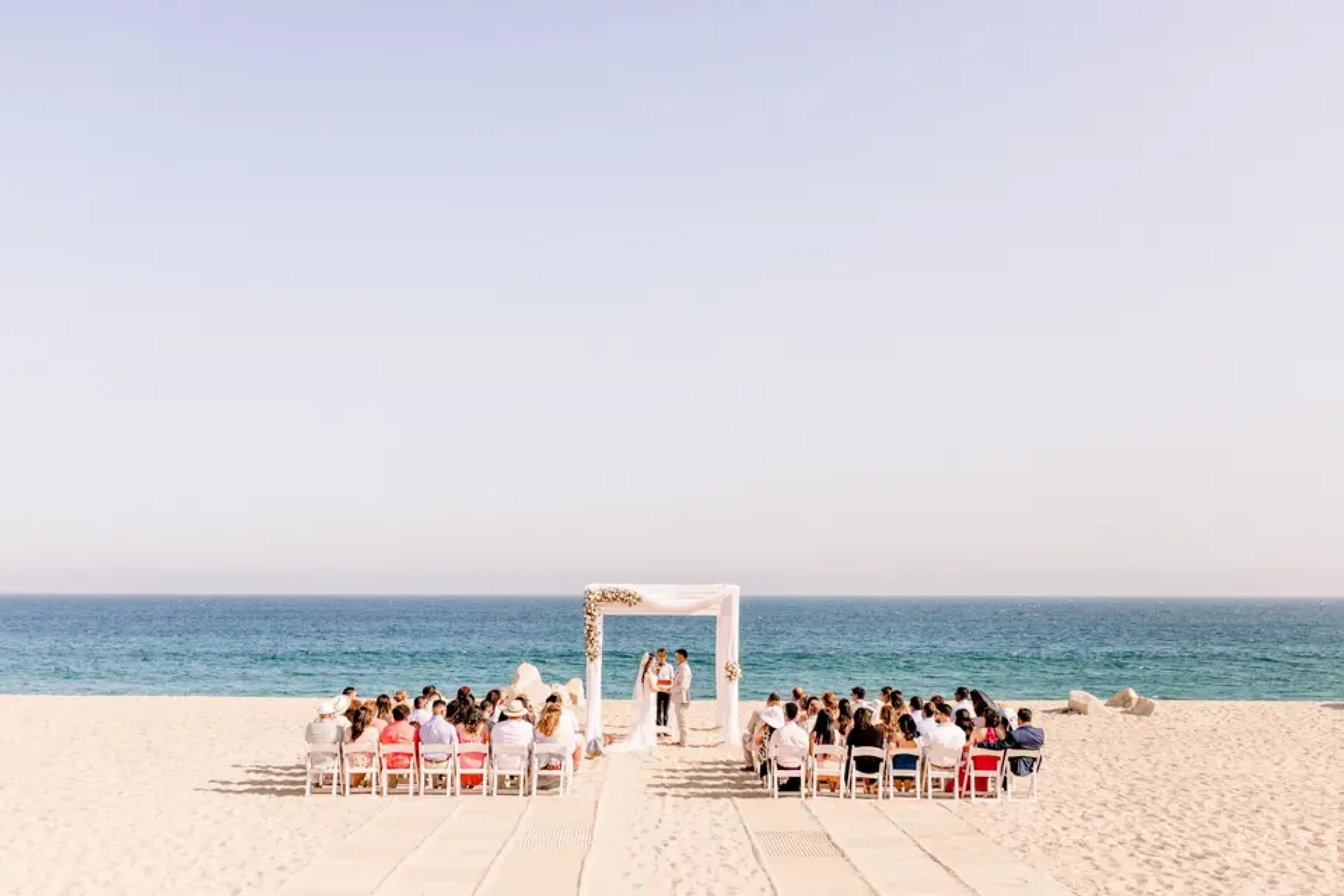 Ceremony decor on the beach at Sandos Finisterra Los Cabos