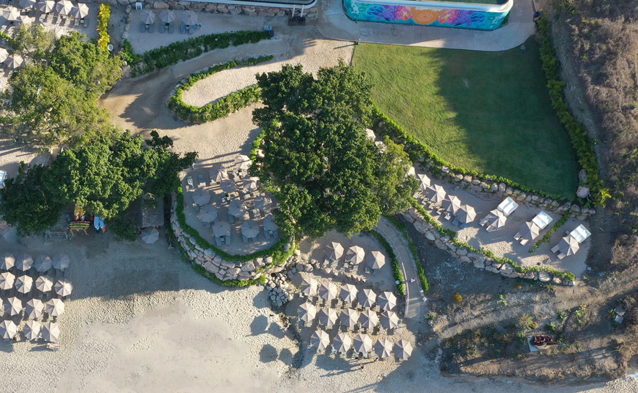 Beach and Sand Terrace Overview at Secrets Bahia Mita Surf and Spa.