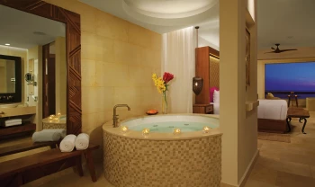Secrets Akumal resort bathroom tub in suite