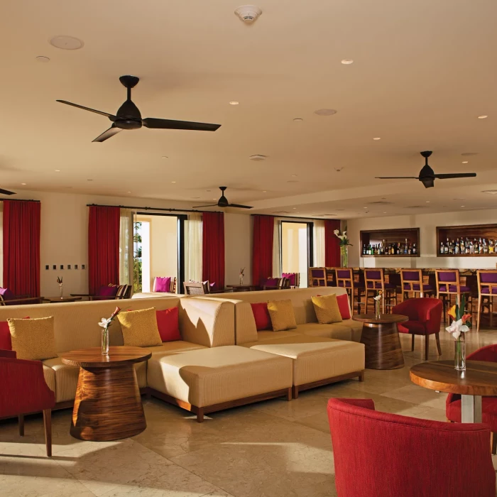 Secrets Akumal resort lounge bar with seating