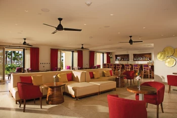 Secrets Akumal resort lounge bar with seating