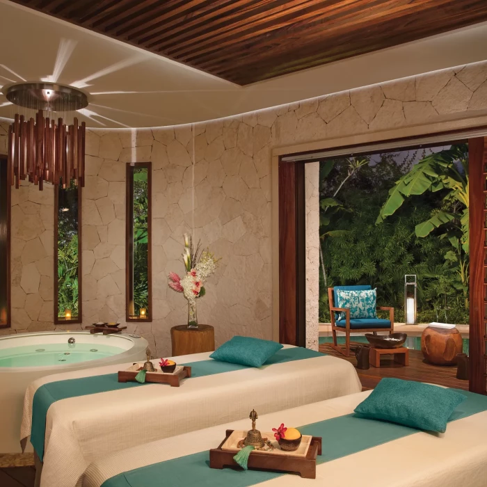 Secrets Akumal resort spa cabin with hot tub and massage chairs