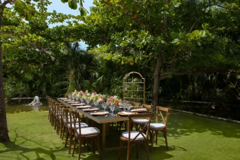 Dinner reception decor on Yalku garden wedding venue at Secrets Akumal Riviera Maya