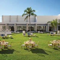 Dinner reception on the garden at Secrets Cap Cana Resort and Spa